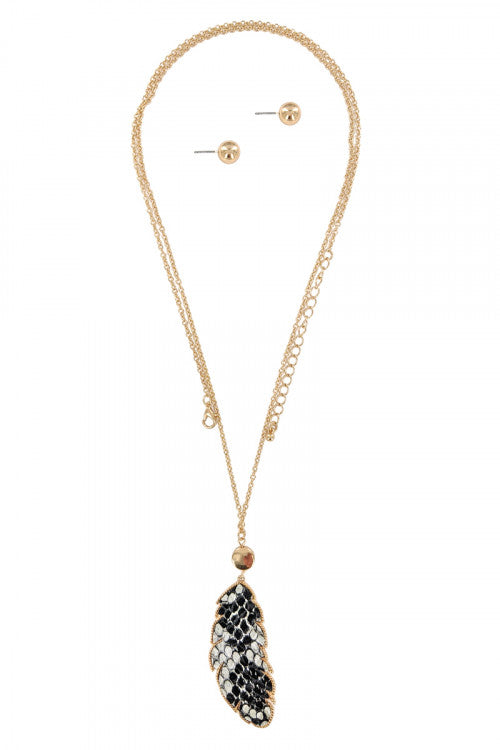 Gold Necklace With Animal Print Design and Earrings