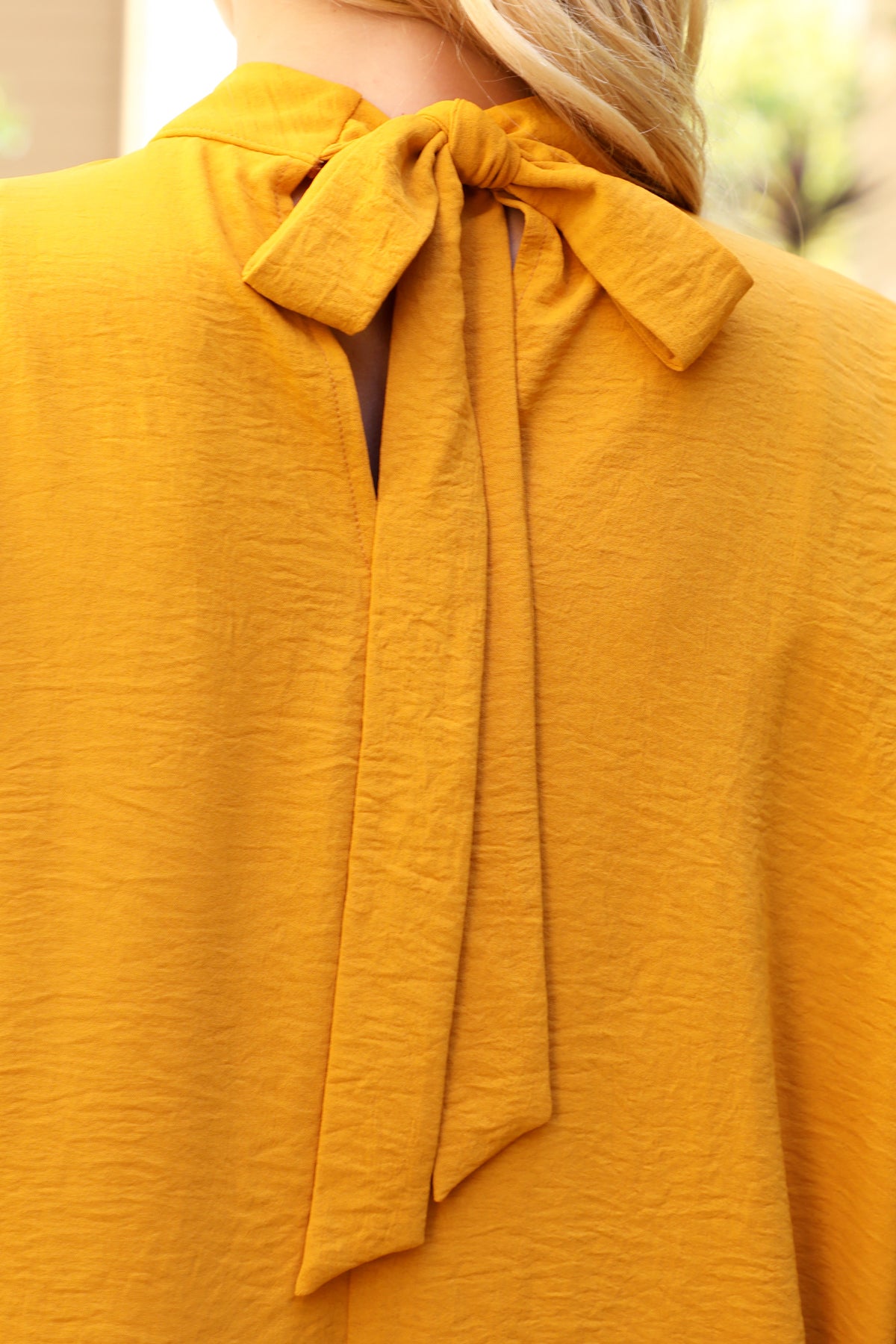 Solid Dolman Sleeve Back Ribbon High Neck Top