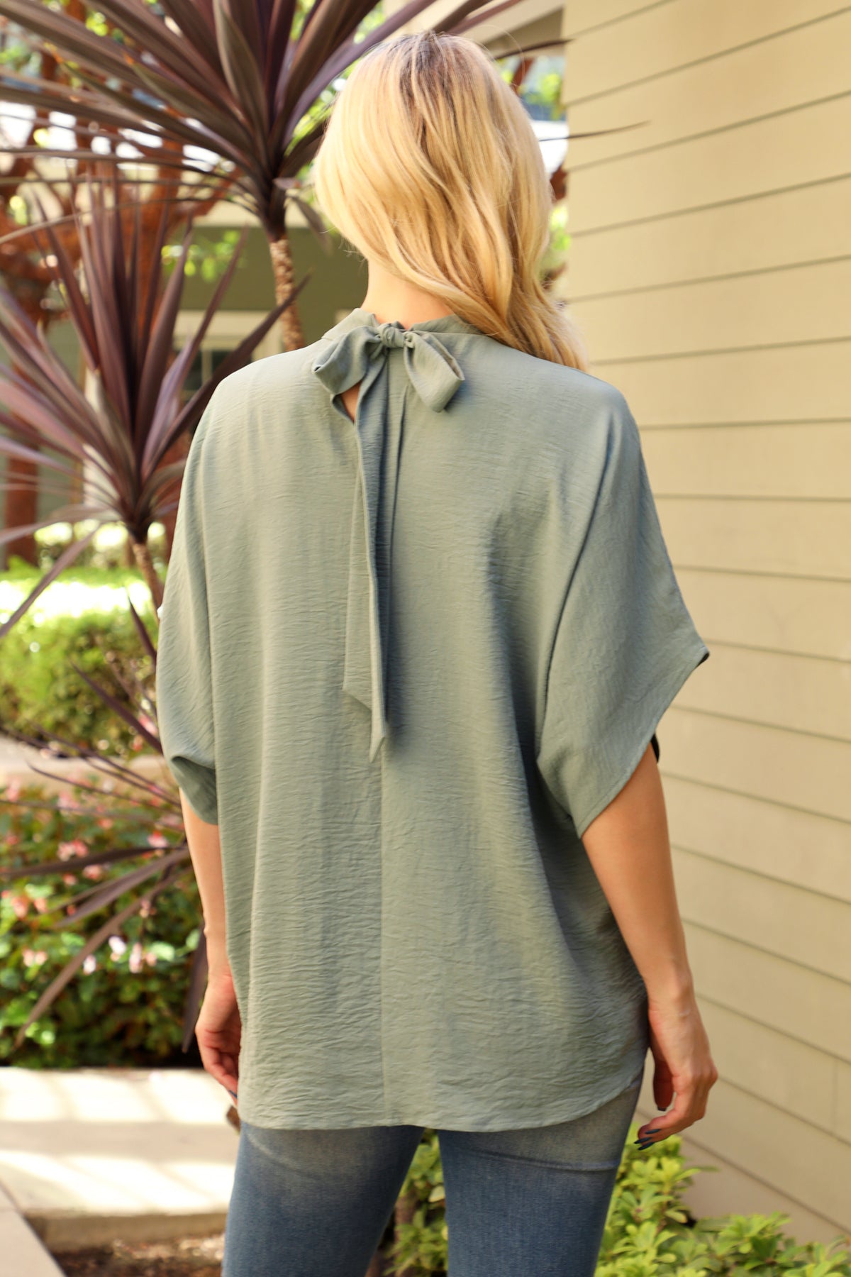 Solid Dolman Sleeve Back Ribbon High Neck Top