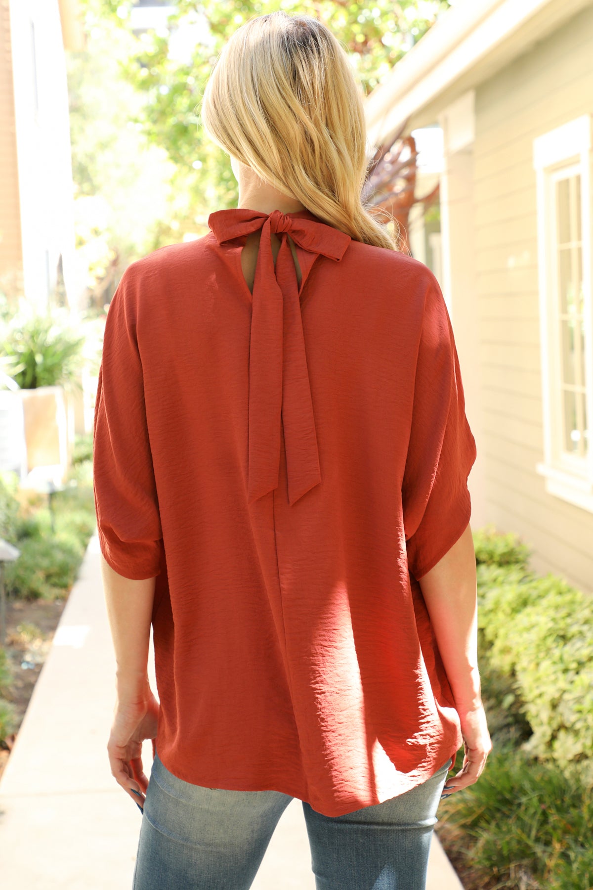 Solid Dolman Sleeve Back Ribbon High Neck Top