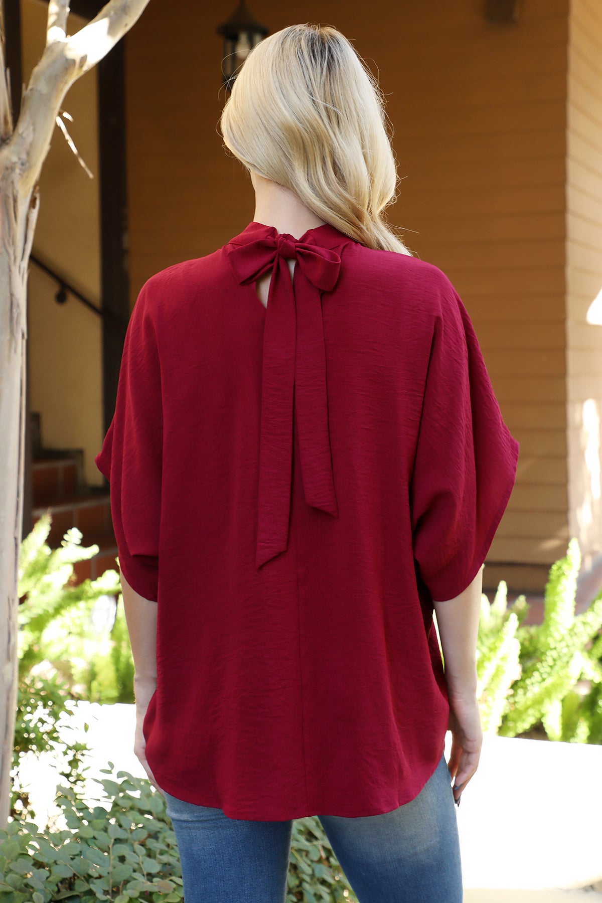 Solid Dolman Sleeve Back Ribbon High Neck Top